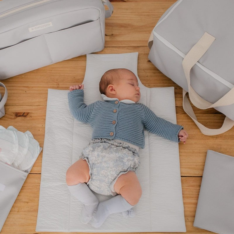 Cambiador portátil de bebé 64