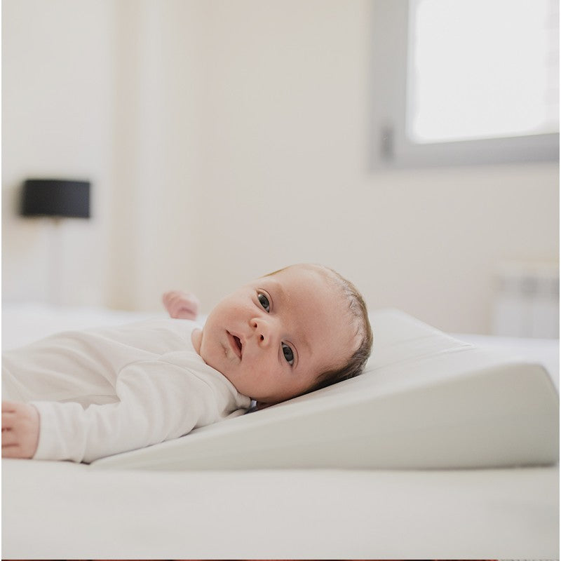 Cuscino antireflusso per neonato