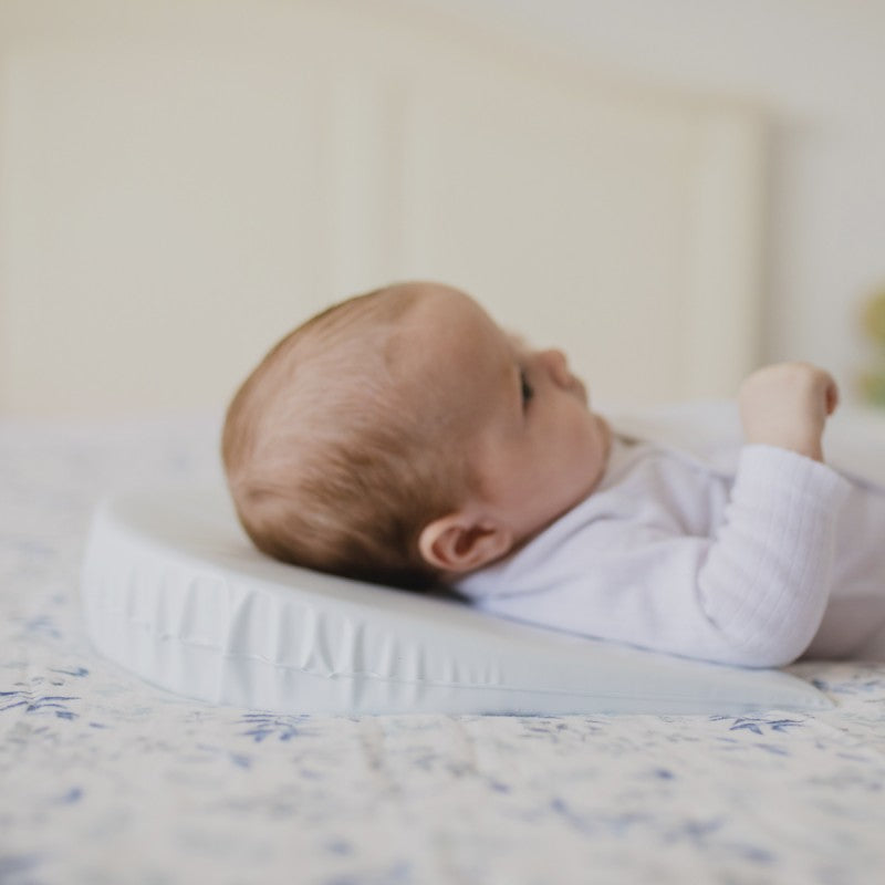 Cuscino antireflusso per neonato